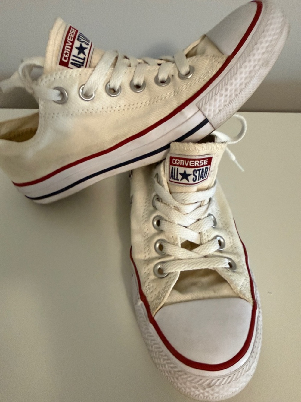 Converse All Star White Canvas Low-Top Sneakers with Red and Blue Logo